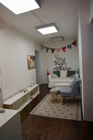 Living room area, kitchen to the left