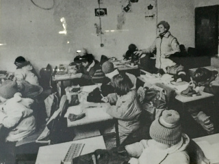 A makeshift classroom during the war. Looks tough