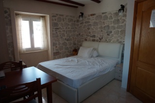 Our Kotor bedroom, stone walls and all. We'll miss it.
