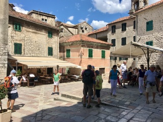 A Kotor square doing its busy midday thing.