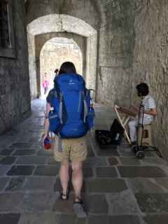 Out through the walls, accordion player on duty.
