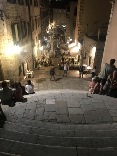 Dinner happening somewhere down those lit-up stairs.