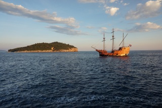 A tall ship and Lokrum, both showing off.