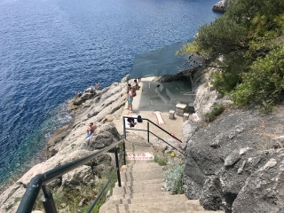 Stairs down to the next swim, ladders into the water.