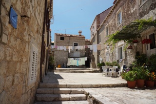 A plaza you could measure in laundry lines.