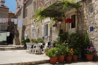 The vine-shaded café we nearly moved into.