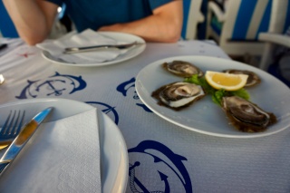 Four oysters and a lemon. The afternoon improved.