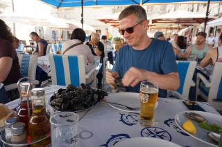 Brian, a pile of mussels, a beer. No complaints.