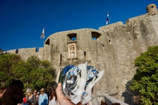 Lunch in foil, held up to the wall at Pile Gate.