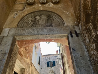 A Madonna over the lintel, Latin still legible if you try.
