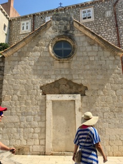 Plain old stone and a rose window.