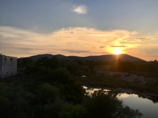 The valley going gold on the way into Mostar.