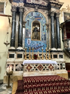 St. Ignatius inside, all gold and red carpet.
