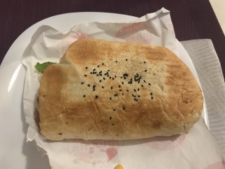 First bread in Bosnia, crusted with black sesame. Hello, country.