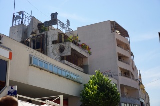 Apartment block with the war still in the masonry.