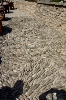 Fish-scale cobbles. We finally looked down.