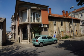 A Mostar corner, and a very teal car.