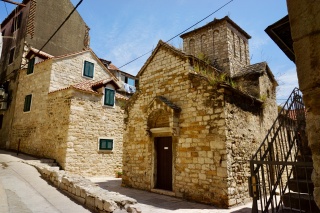 A small stone chapel, just hanging out between the houses.