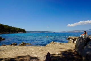 Sun, blue water, a swimmer or two. That's about it.