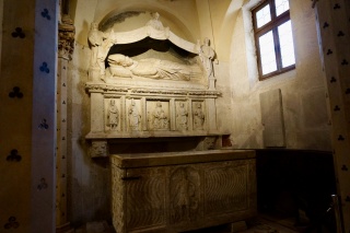 A reliquary tomb, carved figures and all.