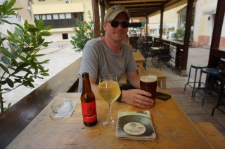 A beer apiece before dinner. He's pleased.