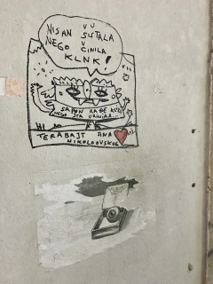 Wall art near dinner. We didn't translate it.