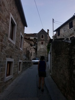 Theresa, heading uphill under the first star.