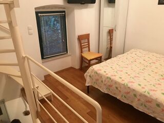 Bedroom packed up. Floral quilt handed off to the next folks.