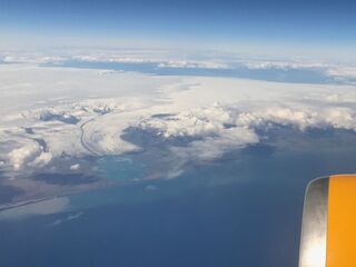 An ice cap sliding down to the sea. Iceland, we think.