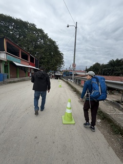 Border crossing on foot with our driver Neil