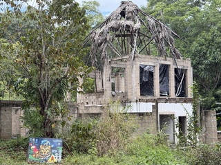 The sign outlined very grand aspirations for this building