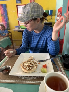 Theresa, struggling to eat and laugh