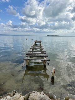 The end of Caye Caulker island. Caye Chapel in the distance